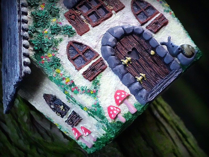 SCULPTED WHIMSICAL HOUSE